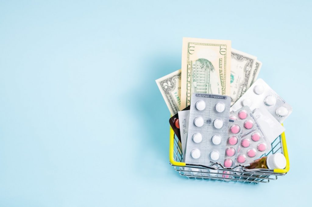 Affording your medications. Illustrated by image of currency and medications together