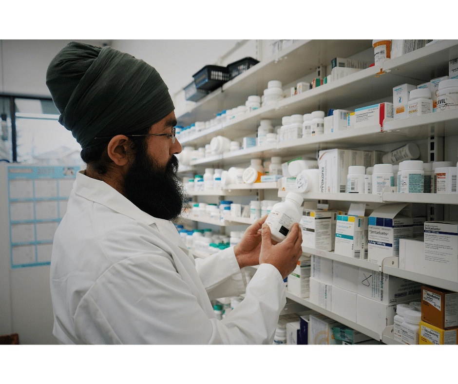 Pharmacist inspects a medication. Your pharmacist can give you the details on whether lovenox or heparin is right for you.