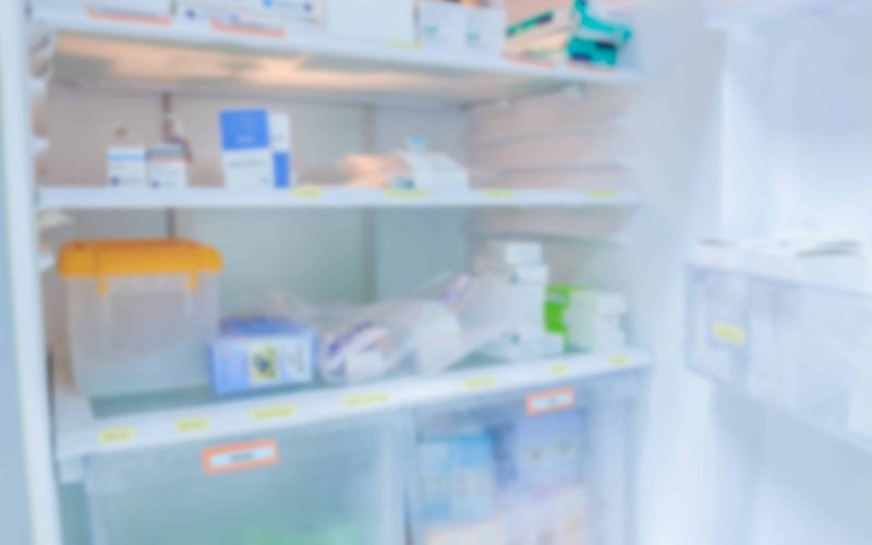 blur background drug shelves in refrigerator