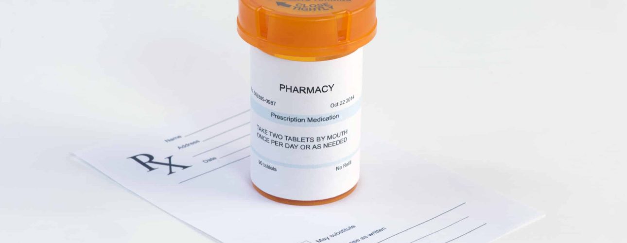 34767427 - orange prescription bottle on blank prescription.