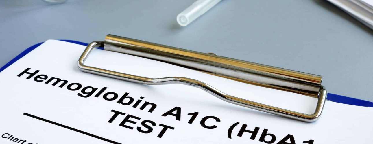 Hemoglobin A1C HbA1c Test form on desk.