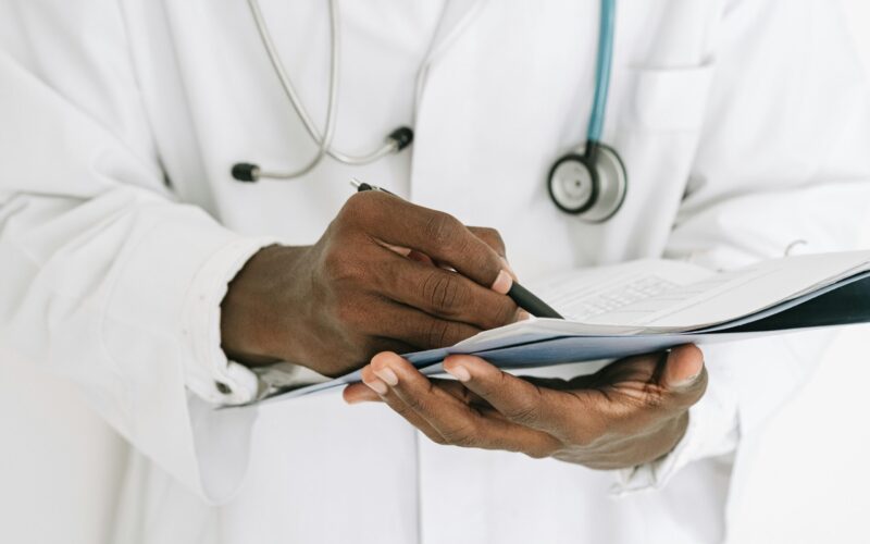 doctor with clipboard, representing obamacare premiums in 2026